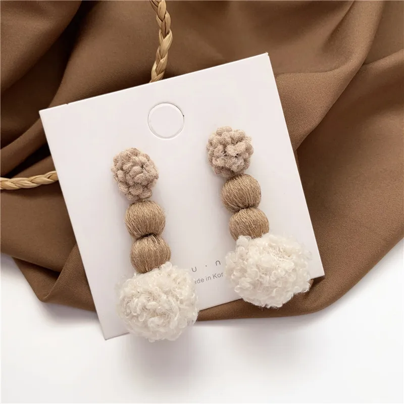 

Personality feels dye-in-the-wood temperament joker contracted senior feeling skeined ball teddy lint earrings fashion earrings