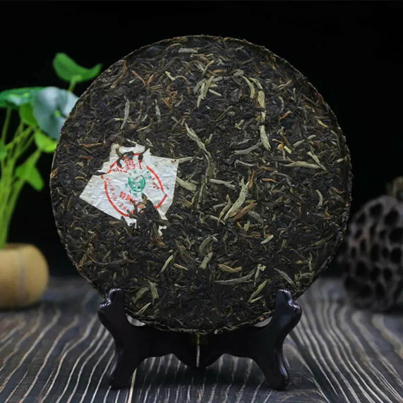 Xiaguan 2013 Sheng Pu-erh Song He Qizi Железный торт сырой чай Пуэр Специальный класс 357 г