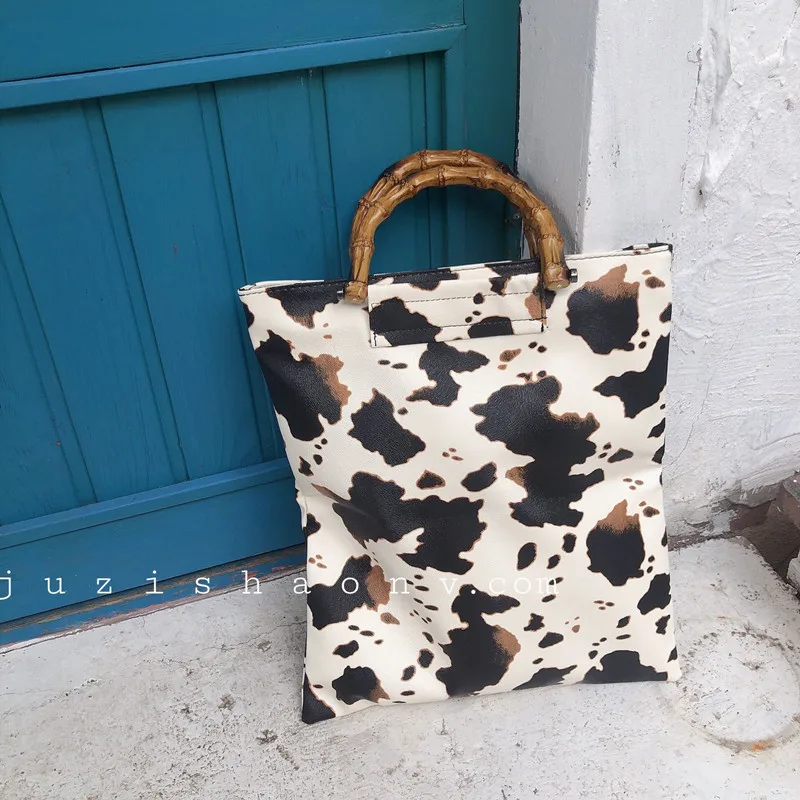 

2019 Summer New Arrivals Women Milk Cow Pattern Shoulder Bag Korea East Gate New Handbag Simple Retro Cow Pattern Bamboo Hand