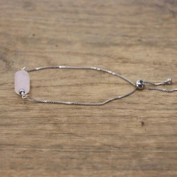 adiating a soft, rosy hue, the Rose Quartz bracelet symbolizes love, compassion, and emotional healing. This image aims to showcase the elegance of the bracelet while highlighting its potential to enhance self-love, deepen connections, and bring about a sense of inner peace. Whether worn as a fashion statement or as a deliberate choice for emotional well-being, the Rose Quartz bracelet captured in this image invites individuals to embrace its gentle, nurturing energy and incorporate it into their daily lives for a harmonious balance of style and holistic wellness.