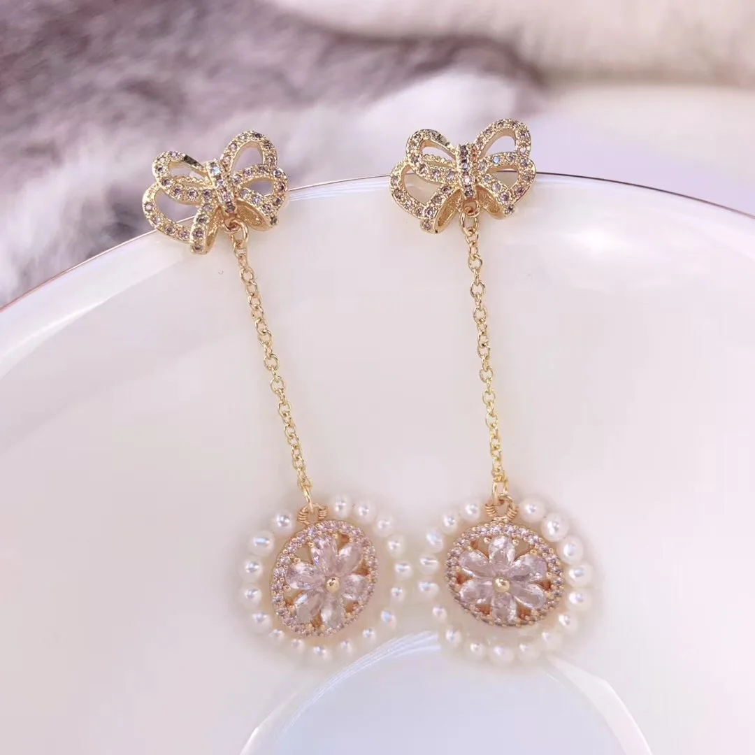 

Butterfly Home Korean-style Sweet Bow 14k Gold 3-4 round Glare Virgine Pearl Earrings Syes14n14aji