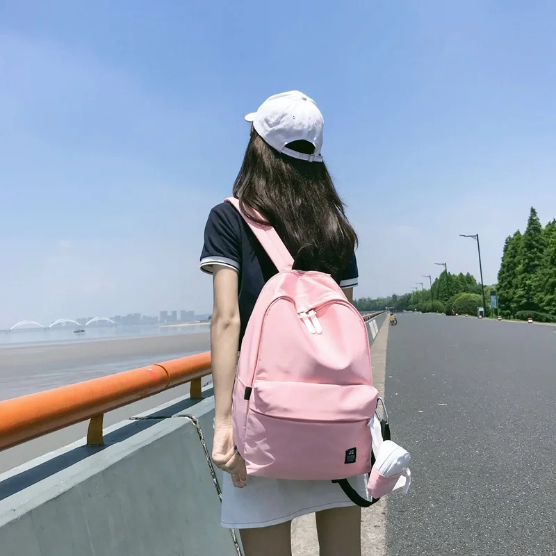 

Simple pure color Xiaoqing Xinfeng student schoolbag female shoulder bag