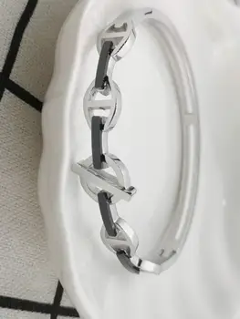 

Gold coin European and American classic brands luxury woman bangles steel