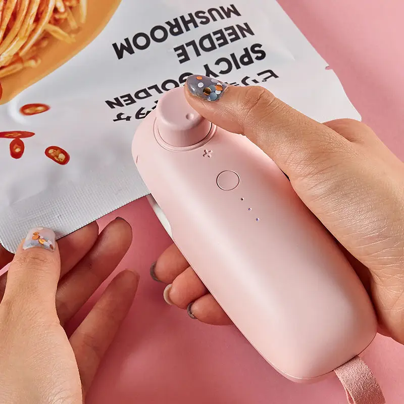 

Mini Sealing Machine Portable Heating Plastic Bag USB Charging Sealing Machine Handheld Vacuum Food Sealing Machine