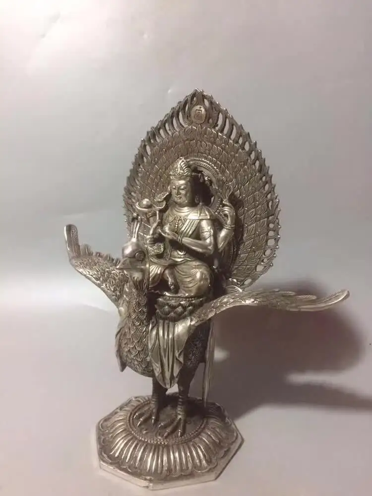 

Chinese Tibetan Silver Hand-made Sculpture Tibetan Acala Buddha Statue Peacock Bronze Sculpture Auspicious Home Decoration