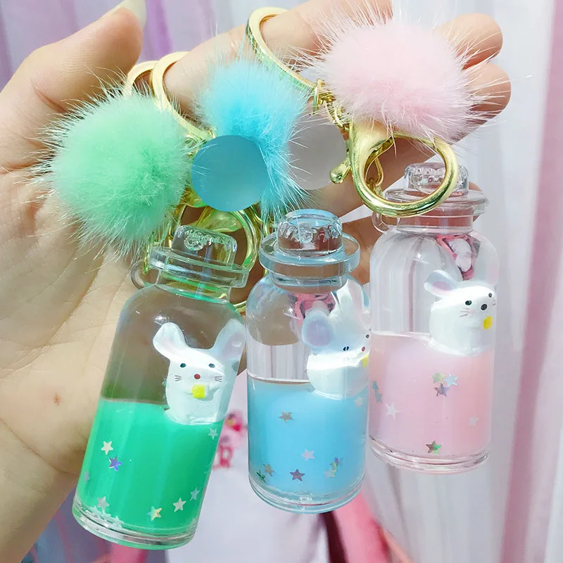

2019 New cute Floating rat fur ball keychain moving quicksand mouse keychains women Bag Jewelry key ring Car pendant gifts