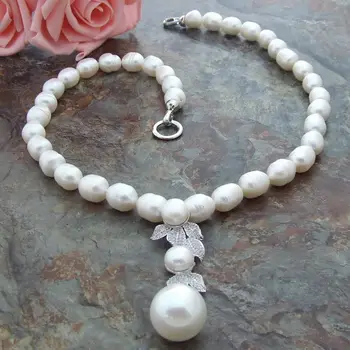 

23" Freshwater White rice Pearl And Sea Shell Pearl Necklace Zircon Pendant