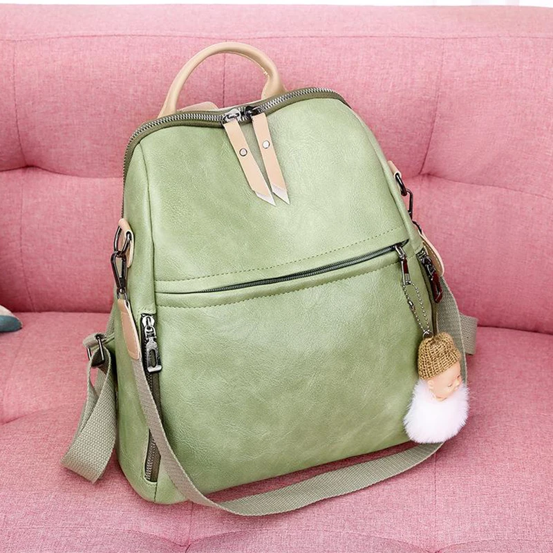green leather rucksack