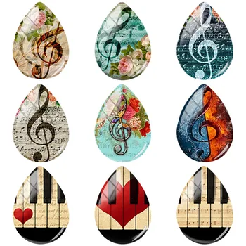 

JWEIJIAO Musical Instruments Piano Violin Pattern 18x25mm Tear Drop Shape Glass Cabochon Dome DIY Handmade Jewelry Parts B640