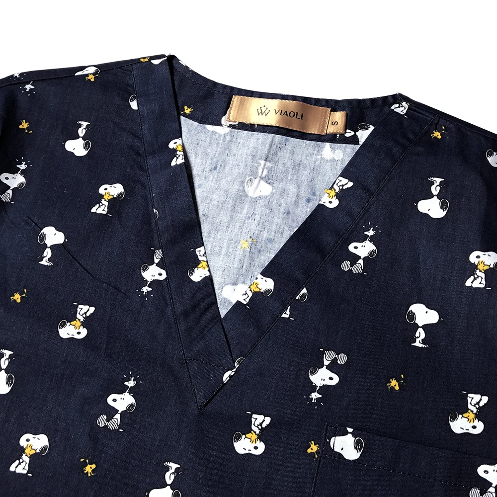 Ceny Nowe psy drukowany wzór bawełna odzież medyczna topy Unisex szpital odzież robocza mundury peeling laboratorium ubrania strój pielęgniarki Spa jednolite