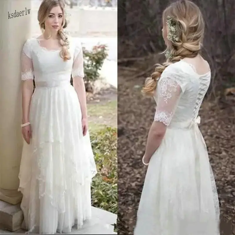 Скромный Boho свадебный наряд с половиной рукава деревенский стиль Сад Свадебные платья Кружева Тюлевое глубокое декольте Иллюзия Свадебное Платье