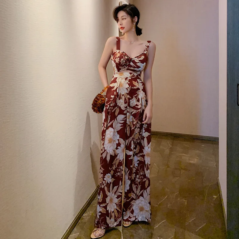 

New High Quality Jumpsuit Ladies Fashion Summer Playsuits Sleeveless Hollow Out Printed Rompers Backless Bow Womens Jumpsuit