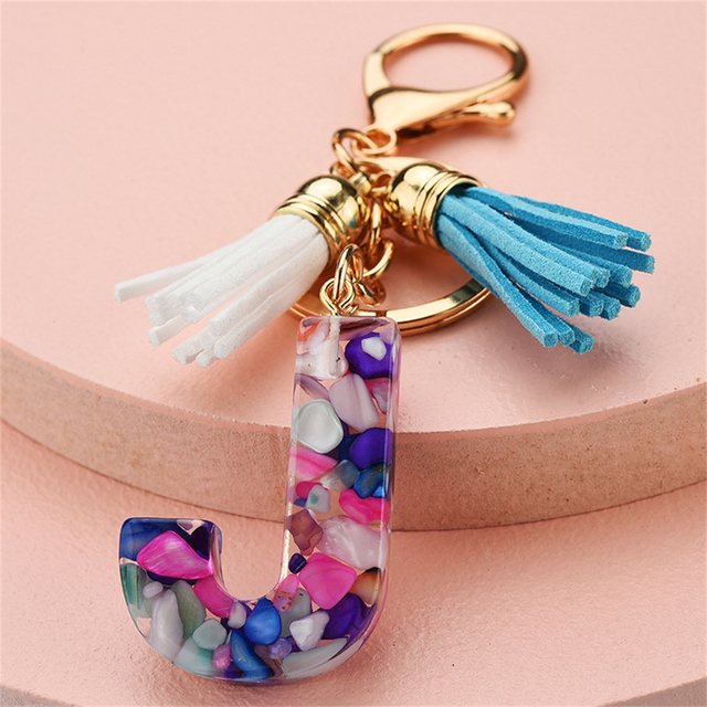Women Keychains 26 Glitter Hollowed-out Words Handbag Tassel English Letter Keyring with Puffer Ball Charms Free Shipping