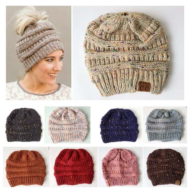 

Euro-American fashionable mixed color wool cap in autumn and winter female acrylic knitted ponytail cap outdoor thermal overhead