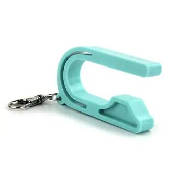 

A blue child safety belt unloader key chain tool unlocks the car seat key for children