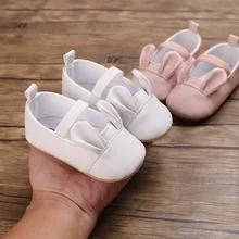 Chaussures plates antidérapantes pour nouveau né, en cuir, semelle en caoutchouc, de couleur unie, avec oreilles de lapin