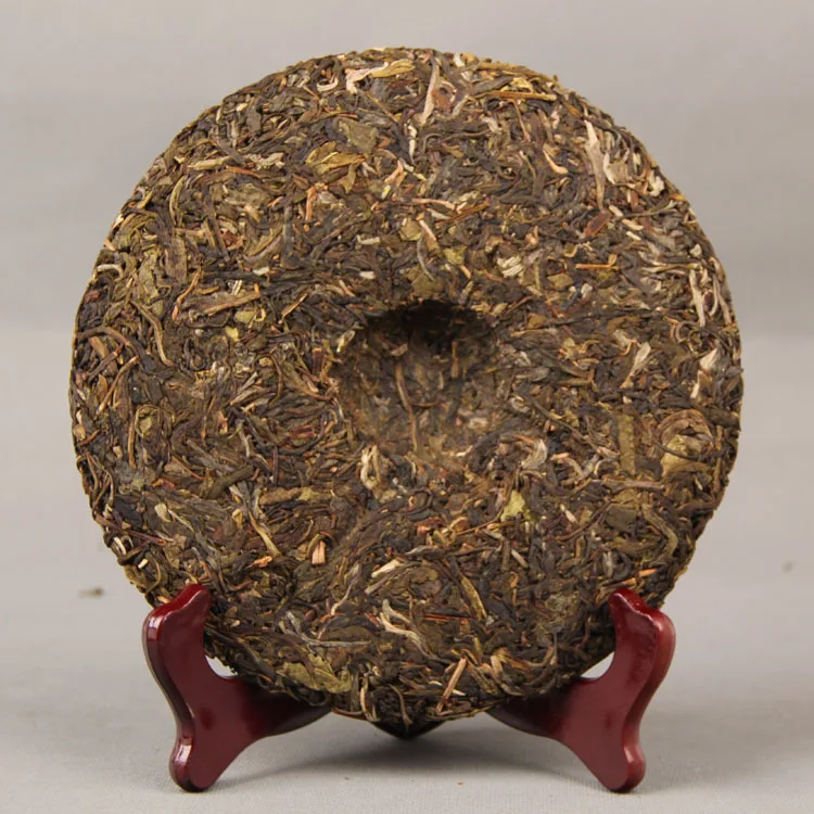 Menghai Ранняя весна сырой Pu-erh Nannuo горный Qizi чай торт 357 г Shen Pu'er чай