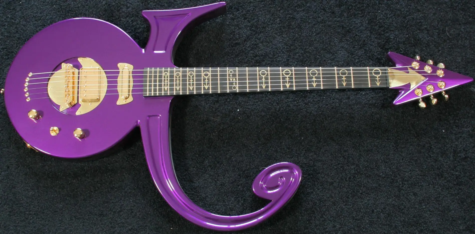 RareShapedGuitarMetallicPurpleRainPrinceSymbolElectricGuitar