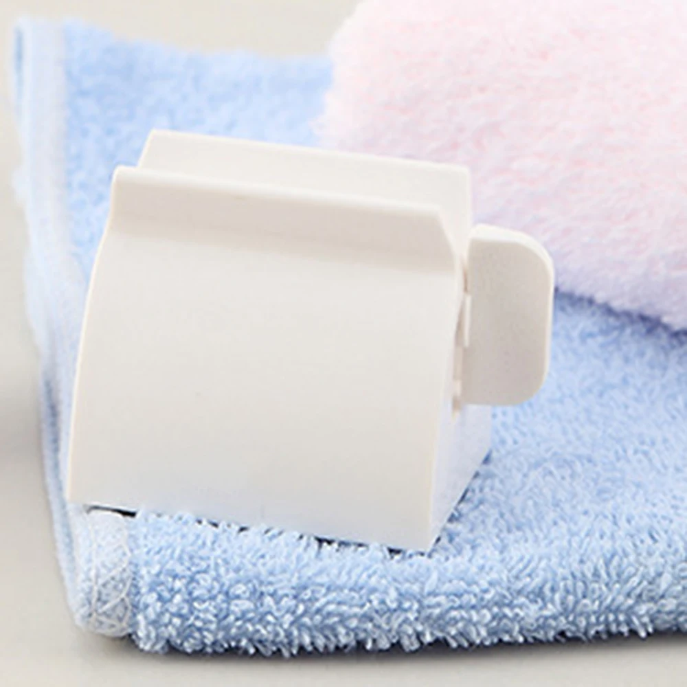 Multifunctional Bathroom Plastic Cream Tube Squeezing Dispenser Rolling Tube Squeezer Tooth Paste Squeezer Toothpaste Dispenser