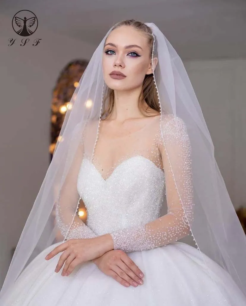 

Elegant Vestidos De Novias Illussion O Neck Beaded Crystals Bling Ball Gown Puffy Long Sleeve Wedding Dress