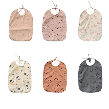 Facciamo ​ Bavaglino con tasca Roba per bambini Accessori per bambini Grembiule da disegno per alimentazione Bavaglini con stampa carina regolabili impermeabili