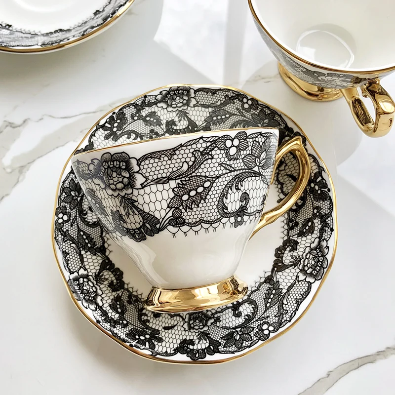 Black lace and gilt bone china dessert plate
