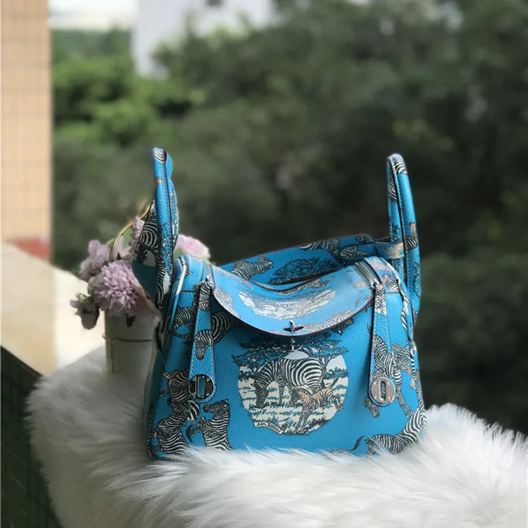 

2020 Painted Lindi Genuine Leather Portable Baotou Layer Cowhide Animal Pattern Personality Bag