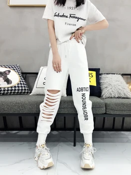 

Oversized hip hop streetwear hole trousers letter print leisure pants lady summer loose pants women new cotton lacing sweatpants