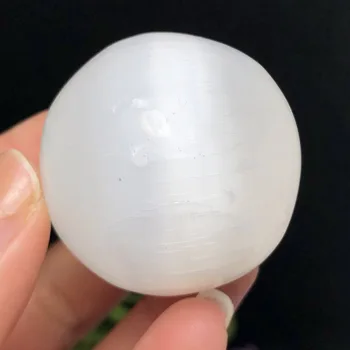

Natural white selenite opal polished crystal spherical stone gemstone healing original gypsum stone massager