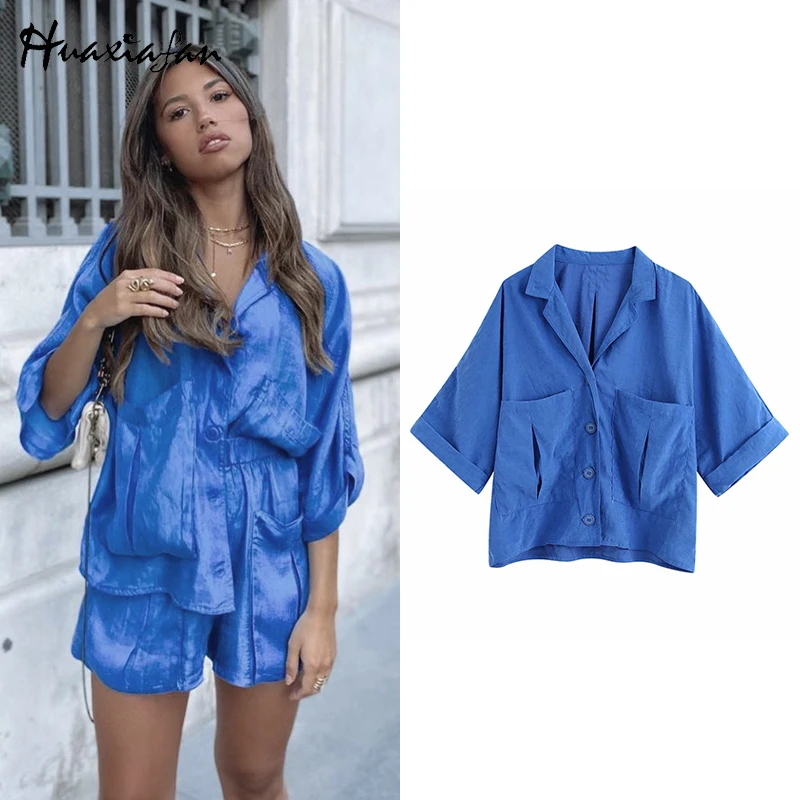 

Huaxiafan Women 2020 Loose-fitting Pockets Pleated Button-up Blouse Vintage Turn-Duwn Collar Half Sleeve Female Shirts Chic Tops