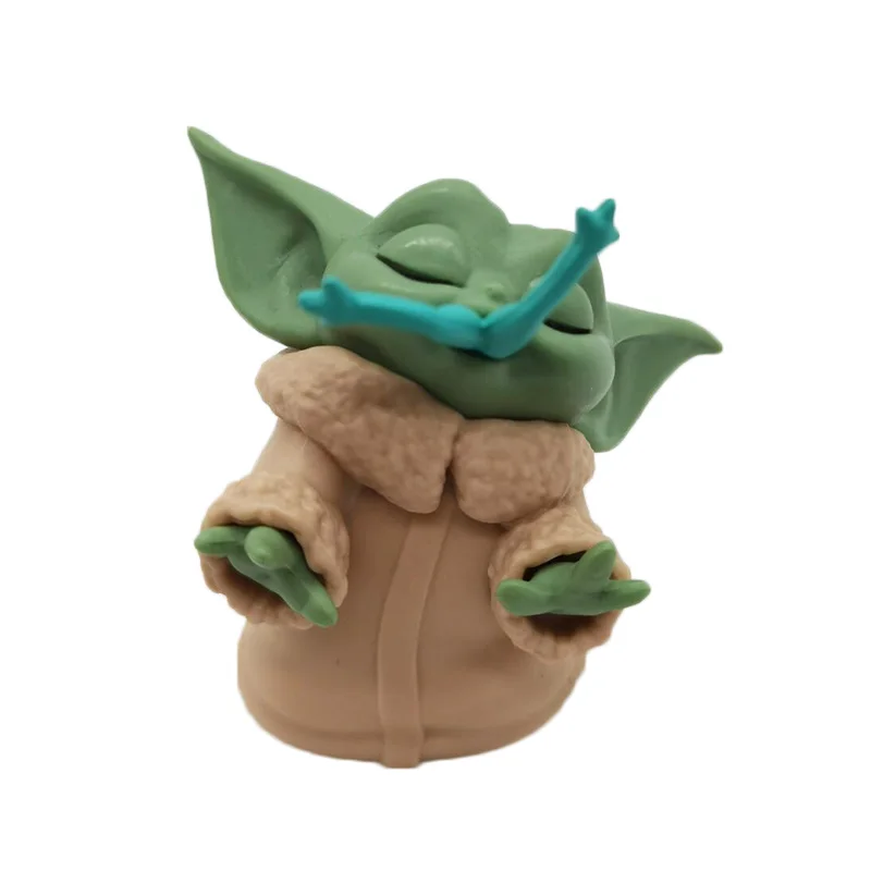 grogu eating frog plush