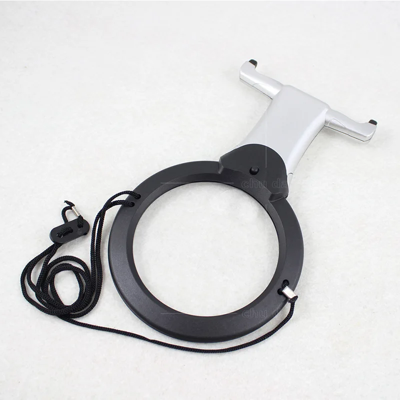 Reading newspapers for the elderly at home with hanging magnifier and reading books with multi-functional magnifier
