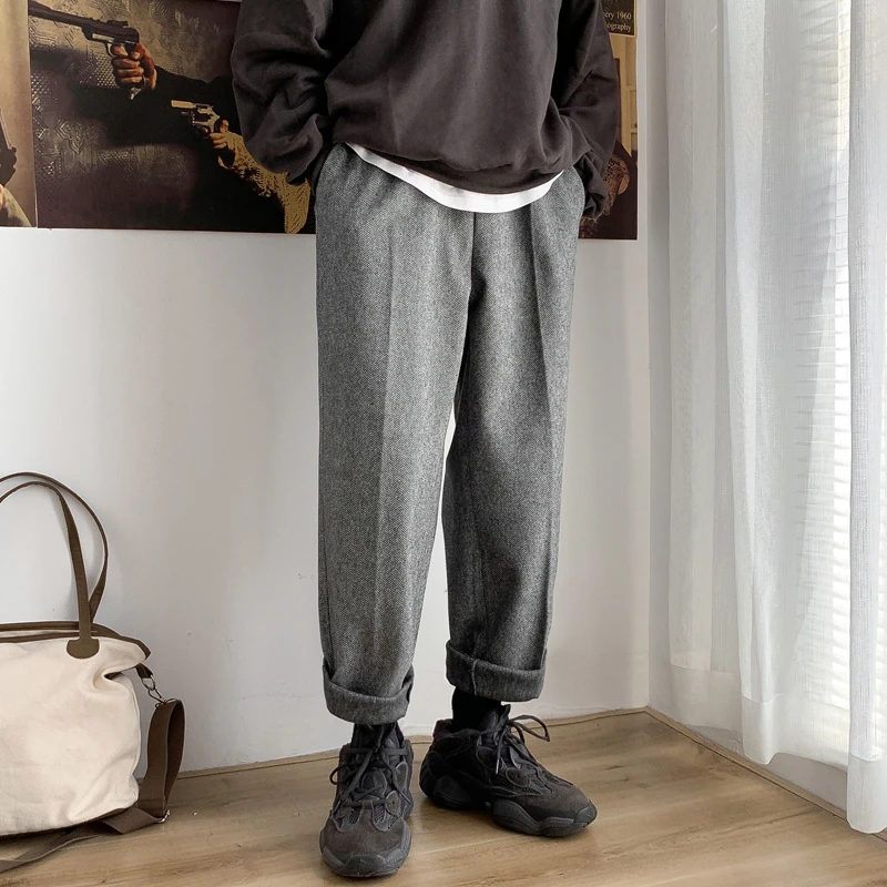 

New fall/winter 2019 slimming solid color slimming body roll feet thickened slacks slacks casual fashion youth men's wear