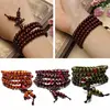 Pulseras budistas de madera de sándalo Natural para hombres y mujeres, nudo de cuentas de oración de Buda, pulseras y brazaletes de ébano negro