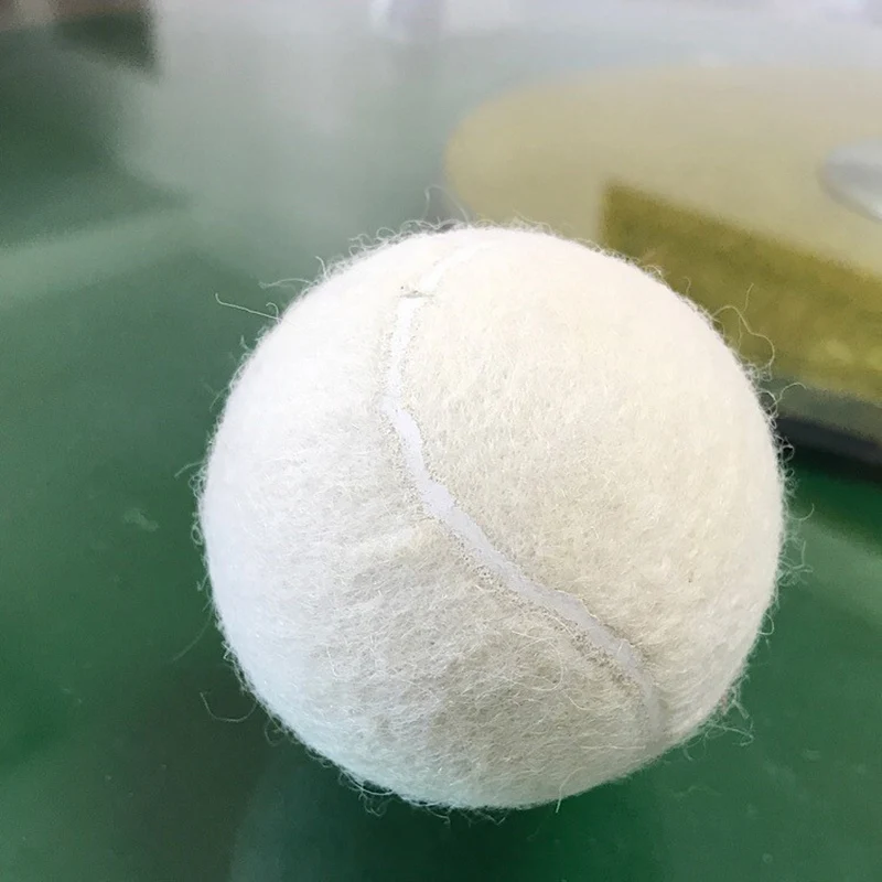 tennis balls down jacket