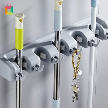 

Multifunctional wall-mounted non-slip broom holder practical clip-on mop storage bag wall-mounted hook storage space saving Cozy