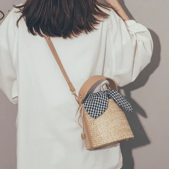 

Grass-woven Holiday Beach Baggage Girls 2019 New Korean Version Baitao Diagonal Baggage Fairy Hand-held Bucket Girls Baggage