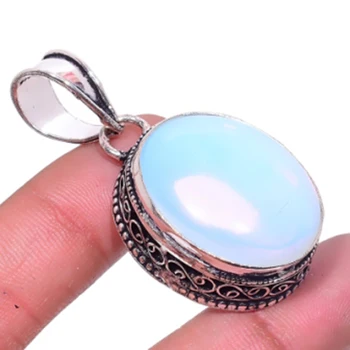 

Fire Opal Pendant Silver Overlay over Copper , 47 mm, P6692