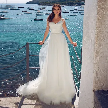 

Off Shoulder Tulle A-Line Wedding Dresses Lace Feather Adorned Beach Bride Party Gowns With Criss Cross Back Bridal Gowns Spring