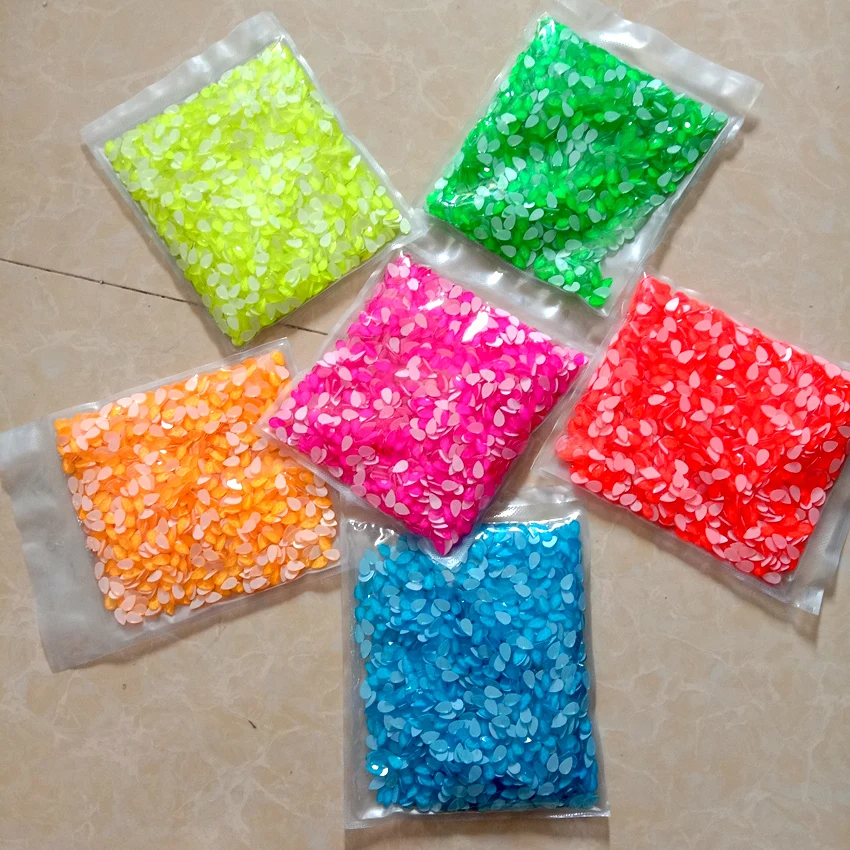 

600pcs Wholesale Crystals Glass Raindrop Fluorescent Nail Rhinestones Glowing in the UV Light Dark 3D Nail Art Decoration