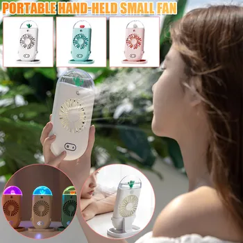 

USB charging humidifier fan Student creative moisturizing handheld small fan Spray humidification is easy to carry Y526