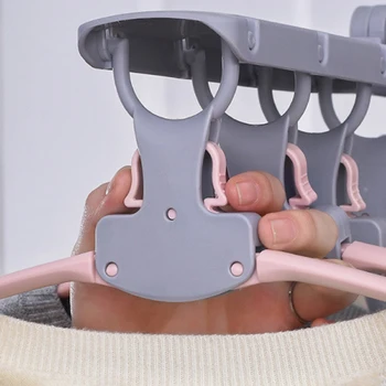 

Artifact multi-layer shrink indoor household wardrobe drying racks Multifunctional folding clothes rack storage