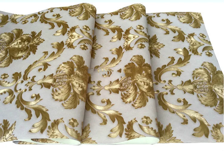 rolo de papel de parede dourado de