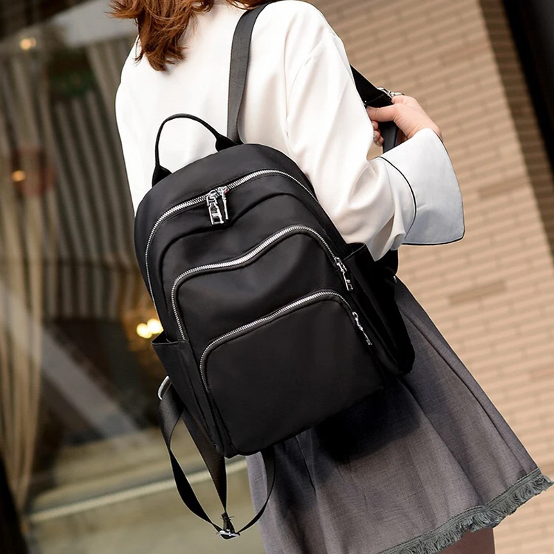 black travel backpack women's