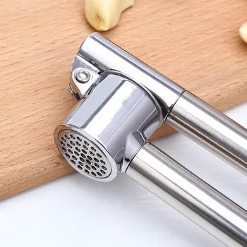 

The supply of multi-functional garlic press household steel manual garlic mashing garlic creative mashing stainless