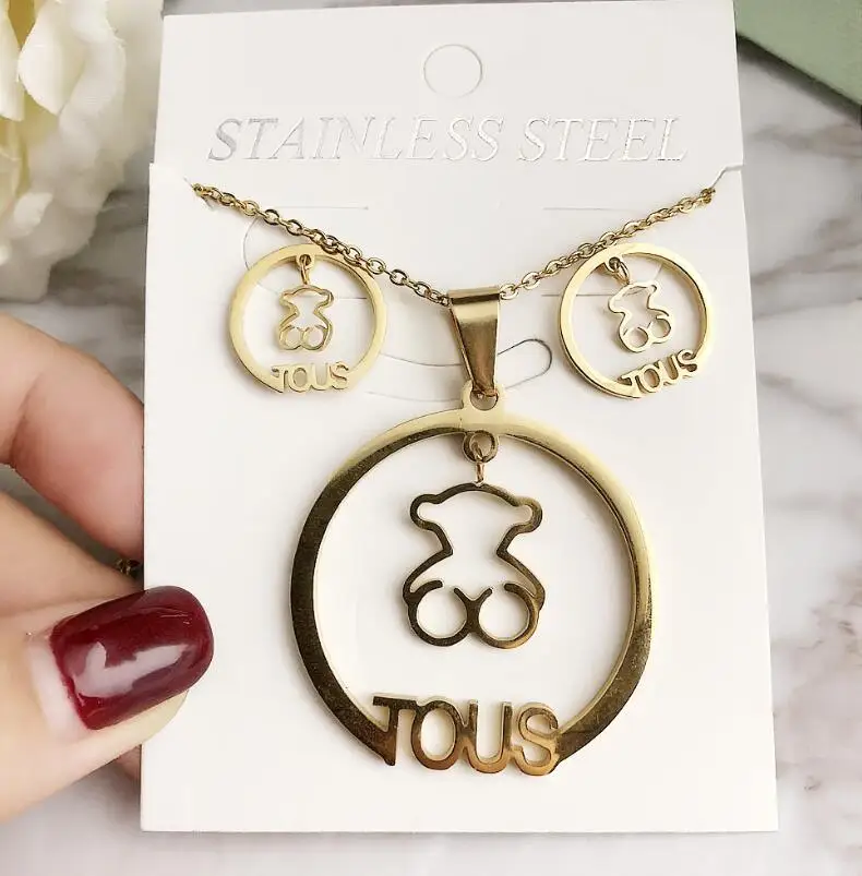 TU117 TOUS Nueva joyería de oso moda caliente pendientes de aleación letra mujeres COLLAR COLGANTE cadena mujer joyas anillo|Camisetas| -