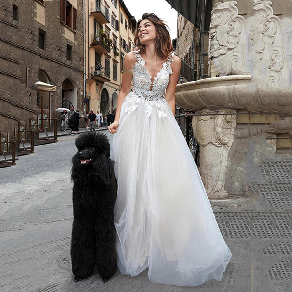 

2020 Lace White/Ivory Wedding Dresses Boho V Neck A Line Lace Bride Dresses Romantic Buttons Back Vestidos de novia