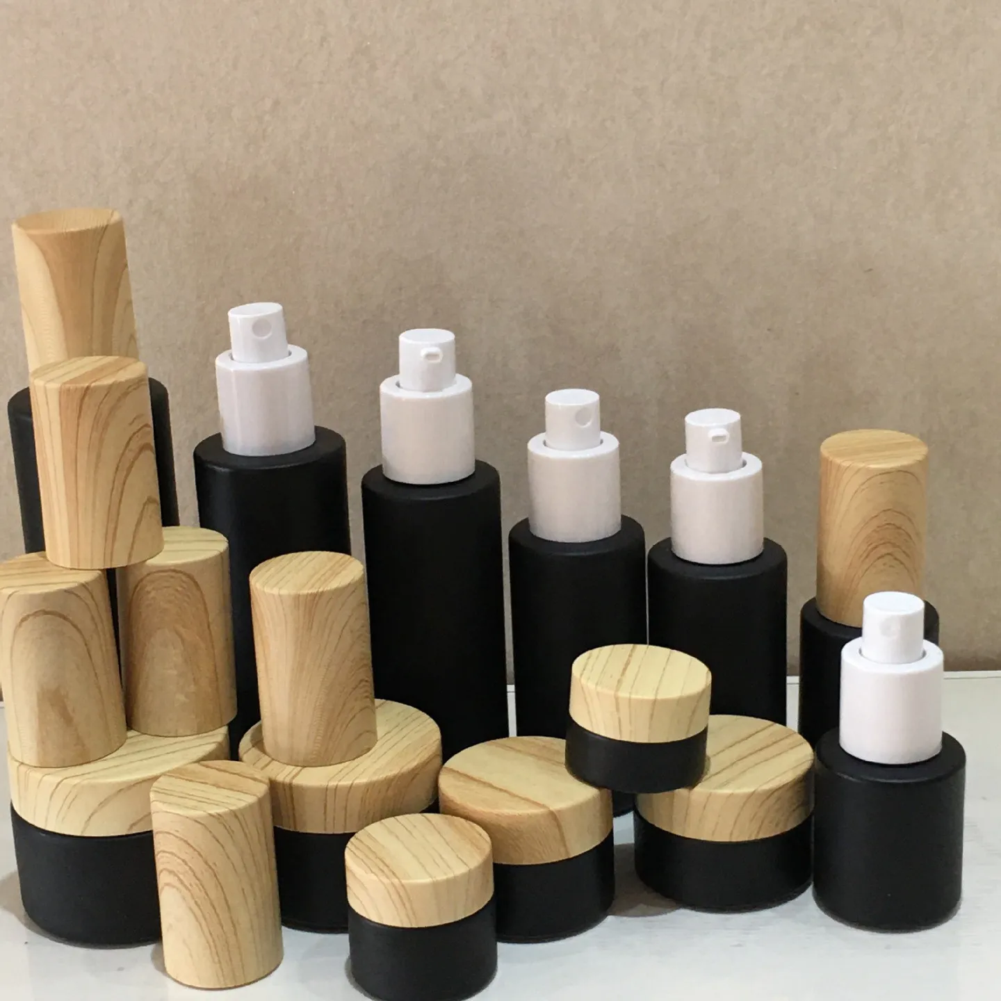 Wholesale cream container matte black frost glass jar with bamboo wood grain lid 5g 10g 15g 20g 30g 50g glass cosmetic jars 1 oz