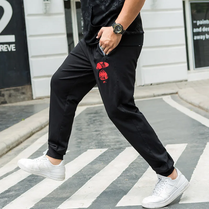 

Plus Fat plus Size Sports Trousers Fat Zi Fat Man Autumn Thin Section Large Size Leisure Elastic Force Close The Mouth Feet