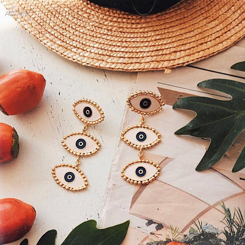

AOMU 2019 New Design Lady Statement Earring Women Metal Gold Color Eye Long Dangle Drop Earrings Fashion Party Wedding Jewelry